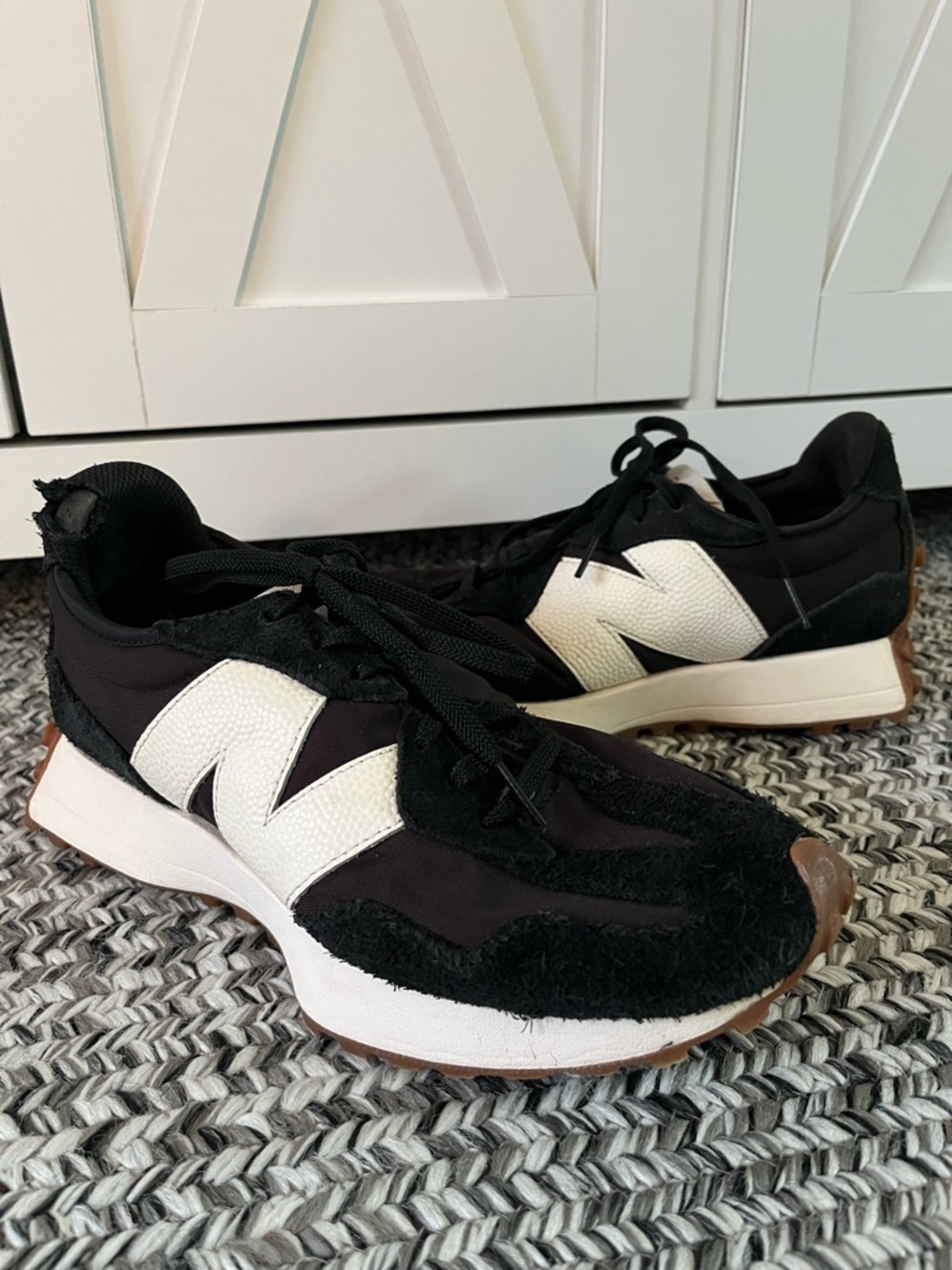 New Balance 327 sneakers in black/white with gum sole, women’s size 9.
